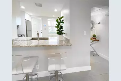 2671 S Course Dr #109, Pompano Beach, FL 33069 - Photo 6