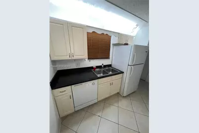 11453 NW 39th Ct #210-2, Coral Springs, FL 33065 - Photo 8