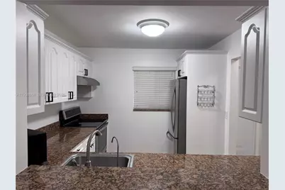 7703 Camino Real #A-307, Miami, FL 33143 - Photo 1