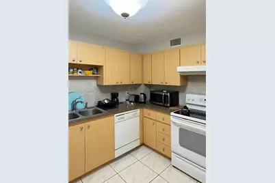 401 Golden Isles Dr #1114, Hallandale Beach, FL 33009 - Photo 14