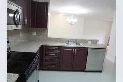 10125 W Sunrise Blvd #104, Plantation, FL 33322 - Photo 2