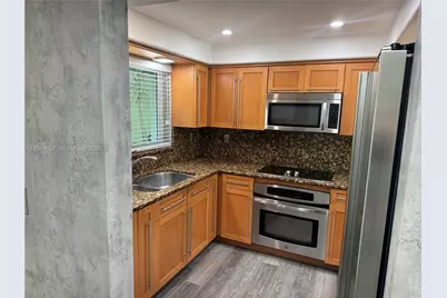 11163 NW 7th St #104, Miami, FL 33172 - Photo 12