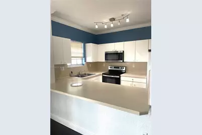 5640 NW 115th Ct #208, Doral, FL 33178 - Photo 6