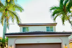 1587 Winterberry Ln, Weston, FL 33327 - Photo 2