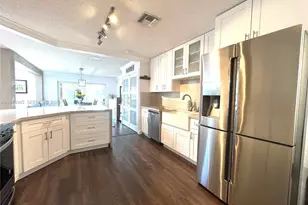 9875 Fairway Cove Ln, Plantation, FL 33324 - Photo 2