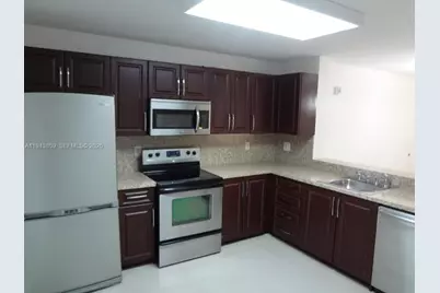 10125 W Sunrise Blvd #104, Plantation, FL 33322 - Photo 1