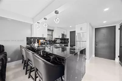 2302 S Cypress Bend Dr #306, Pompano Beach, FL 33069 - Photo 1