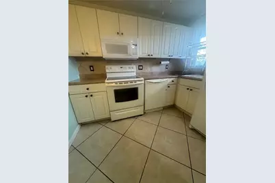 8590 Sunrise Lakes Blvd #109, Sunrise, FL 33322 - Photo 2