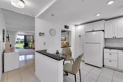 2430 Deer Creek Country Club Blvd #206-2, Deerfield Beach, FL 33442 - Photo 2