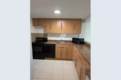 8060 N Colony Cir N #107, Tamarac, FL 33321 - Photo 1