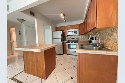 851 Three Islands Blvd #106, Hallandale Beach, FL 33009 - Photo 8