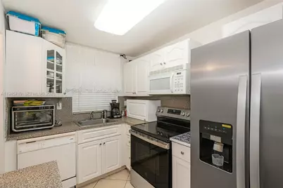 9660 Sunrise Lakes Blvd #202, Sunrise, FL 33322 - Photo 2