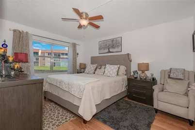 9881 NW Sunrise Lakes Blvd #106, Sunrise, FL 33322 - Photo 16