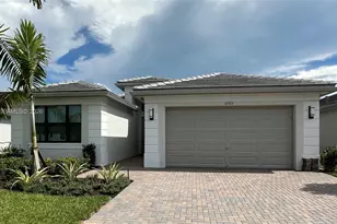 10922 SW Meandering Mile Rd, Port Saint Lucie, FL 34987 - Photo 1
