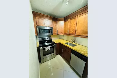 4717 NW 7th St #308-10, Miami, FL 33126 - Photo 1