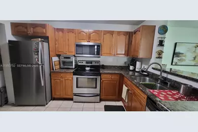 11295 W Atlantic Blvd #303, Coral Springs, FL 33071 - Photo 6