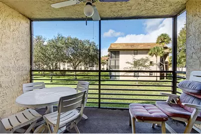 6085 N Sabal Palm Blvd #208, Tamarac, FL 33319 - Photo 1