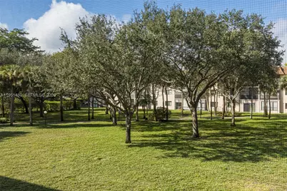 6085 N Sabal Palm Blvd #208, Tamarac, FL 33319 - Photo 1