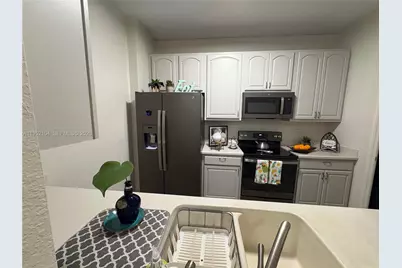 3314 Robert Trent Jones Drive #205, Orlando, FL 32835 - Photo 6