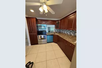 6095 N Sabal Palm Blvd #104, Tamarac, FL 33319 - Photo 1