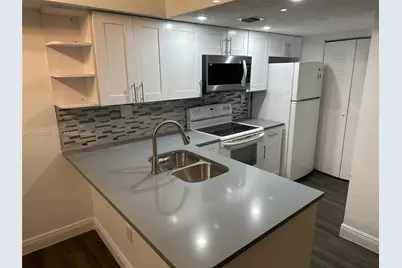 7155 NW 179th St #304, Hialeah, FL 33015 - Photo 2