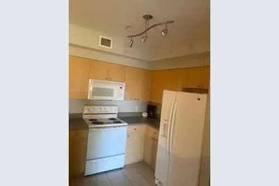 7930 N Nob Hill Rd #304, Tamarac, FL 33321 - Photo 10