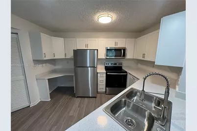 4015 W McNab Rd #D104, Pompano Beach, FL 33069 - Photo 1