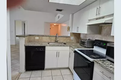 5011 Wiles Rd #306, Coconut Creek, FL 33073 - Photo 4