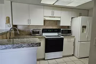 5011 Wiles Rd, Coconut Creek, FL 33073 - Photo 4