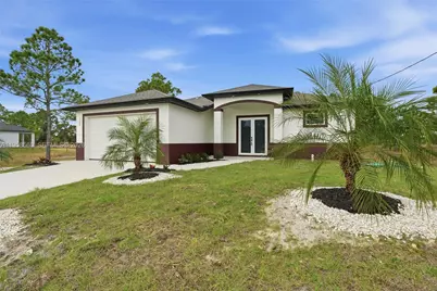 1042 Marshall Ave, Lehigh Acres, FL 33974 - Photo 2
