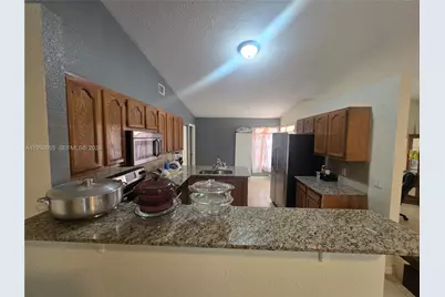 4673 SW Obelisk St, Port Saint Lucie, FL 34953 - Photo 6
