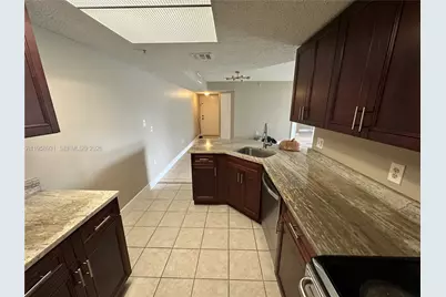 5005 Wiles Rd #104, Coconut Creek, FL 33073 - Photo 8