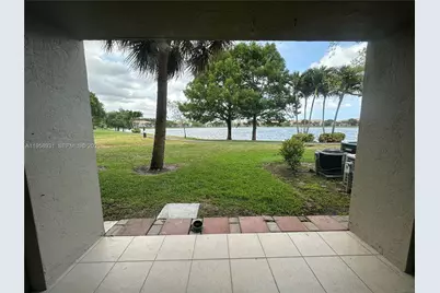 5005 Wiles Rd #104, Coconut Creek, FL 33073 - Photo 1