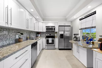 3850 Oaks Clubhouse Dr #504, Pompano Beach, FL 33069 - Photo 2