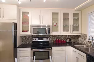 137 Golden Isles Dr, Hallandale Beach, FL 33009 - Photo 12