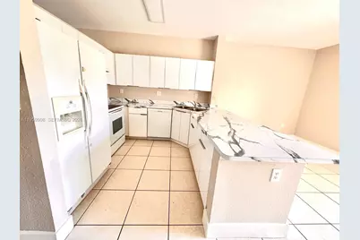 6940 NW 179th St #108-7, Hialeah, FL 33015 - Photo 8