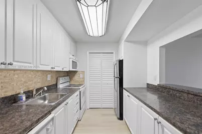 301 Racquet Club Rd #103, Weston, FL 33326 - Photo 12