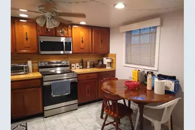 7554 Stirling Rd #105, Davie, FL 33024 - Photo 2