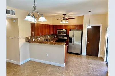 11115 W Okeechobee Rd #109, Hialeah Gardens, FL 33018 - Photo 1
