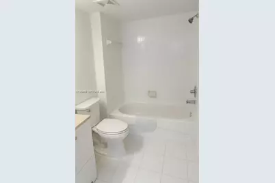 1150 Wildwood Lakes Blvd #203, Naples, FL 34104 - Photo 12