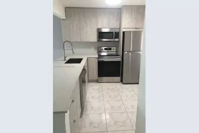 1201 NE 191st St #G411, Miami, FL 33179 - Photo 4