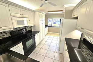 10722 W Clairmont Cir, Tamarac, FL 33321 - Photo 12