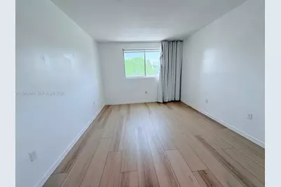 201 Golden Isles Dr #311, Hallandale Beach, FL 33009 - Photo 8