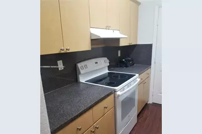 941 NE 169th St #216, North Miami Beach, FL 33162 - Photo 1