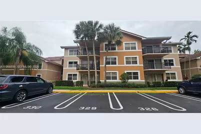 9001 Wiles Rd #103-3, Coral Springs, FL 33067 - Photo 2