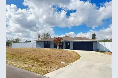 702 NW Orchid St, Port Saint Lucie, FL 34983 - Photo 1