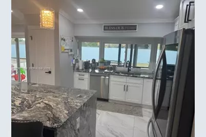 702 NW Orchid St, Port Saint Lucie, FL 34983 - Photo 4