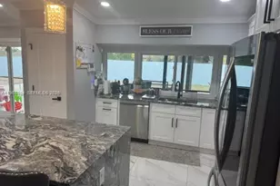 702 NW Orchid St, Port Saint Lucie, FL 34983 - Photo 4