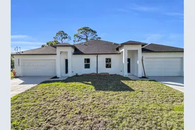 216 S Homer St, Lehigh Acres, FL 33971 - Photo 1