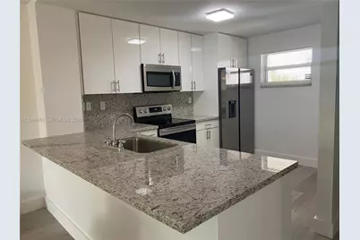 1075 Riverside Dr #405, Coral Springs, FL 33071 - Photo 10